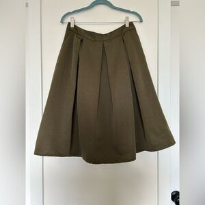 A shape olive green skirt